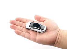 Load image into Gallery viewer, XCARTOYS 1:64 White Xpeng Mona M03 EV Sedan Sports Model Diecast Metal Car New Collection