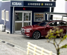 Load image into Gallery viewer, MINIGT 1:64 Red BMW i7 xDrive 60 Aventurin Luxury Model Diecast Metal Car New Collection
