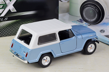 Load image into Gallery viewer, WELLY 1:24 1967 Jeepster Commando Station Wagon Model Diecast Metal Car New