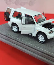 Load image into Gallery viewer, IHCM 1:64 HEC White Pajero Evolution ORV Sports Open Model Diecast Metal Car