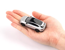 Load image into Gallery viewer, XCARTOYS 1:64 Silver Xpeng G7 EV SUV Sports Model Diecast Metal Car New Collection