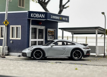Load image into Gallery viewer, MINIGT 1:64 Ice Gray Porsche 911 Dakar Sports Model Diecast Metal Car New Collection