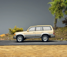 Load image into Gallery viewer, Masdi 1:64 1994 Gold Land Cruiser LC80 ORV Sports Model Diecast Metal Car New Collection