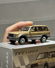 Load image into Gallery viewer, Masdi 1:64 1994 Gold Land Cruiser LC80 ORV Sports Model Diecast Metal Car New Collection

