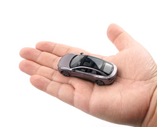 Load image into Gallery viewer, XCARTOYS 1:64 Purple Xpeng Mona M03 EV Sedan Sport Model Diecast Metal Car New Collection
