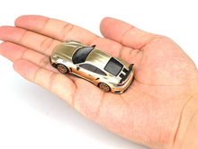 Load image into Gallery viewer, Poprace 1:64 Gold 992 Stinger GTR Racing Sports Model Diecast Metal Car New Collection
