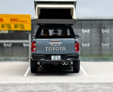 Load image into Gallery viewer, Tarmac 1:64 Gray Hilux Pickup Truck Roof Tent Sports Model Diecast Metal Car
