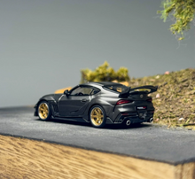 Load image into Gallery viewer, Xcartoys 1:64 Black Carbon JDM Supra A90 Sports Model Diecast Metal Car New Collection
