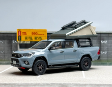 Load image into Gallery viewer, Tarmac 1:64 Gray Hilux Pickup Truck Roof Tent Sports Model Diecast Metal Car
