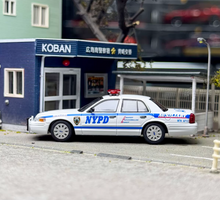 Load image into Gallery viewer, Rollin 1:64 White Auxiliary Police CV CROWN VICTORIA Model Diecast Metal Car

