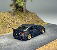 Load image into Gallery viewer, Xcartoys 1:64 Black Carbon JDM Supra A90 Sports Model Diecast Metal Car New Collection

