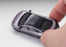 Load image into Gallery viewer, XCARTOYS 1:64 Purple Xpeng Mona M03 EV Sedan Sport Model Diecast Metal Car New Collection
