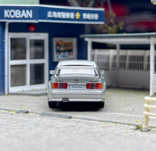 Load image into Gallery viewer, Minigt 1:64 Silver 190E 2.5-16 Evolution II Sports Model Diecast Metal Car New Collection
