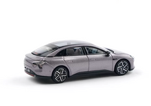 Load image into Gallery viewer, XCARTOYS 1:64 Purple Xpeng Mona M03 EV Sedan Sport Model Diecast Metal Car New Collection
