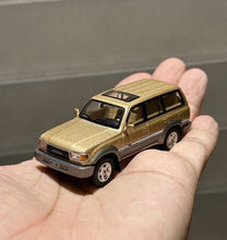 Load image into Gallery viewer, Masdi 1:64 1994 Gold Land Cruiser LC80 ORV Sports Model Diecast Metal Car New Collection
