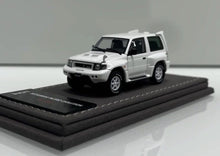 Load image into Gallery viewer, IHCM 1:64 HEC White Pajero Evolution ORV Sports Open Model Diecast Metal Car
