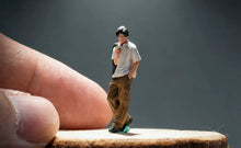 Load image into Gallery viewer, 1:64 Painted Figure Model Miniature Resin Diorama Toy Sand Cool Man Walking Boy
