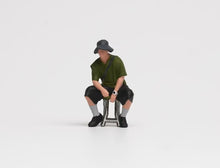 Load image into Gallery viewer, 1:64 Painted Figure Model Miniature Resin Diorama Sand Sitting Cool Hat Man Boy
