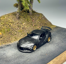 Load image into Gallery viewer, Xcartoys 1:64 Black Carbon JDM Supra A90 Sports Model Diecast Metal Car New Collection
