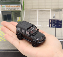 Load image into Gallery viewer, NZG 1:64 AMG G63 4x4 SUV Off Road Sports Model Diecast Metal Car
