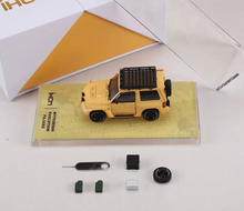 Load image into Gallery viewer, IHCM 1:64 Yellow Pajero EVO V55 ORV SUV Open Model Diecast Metal Car Box New Collection
